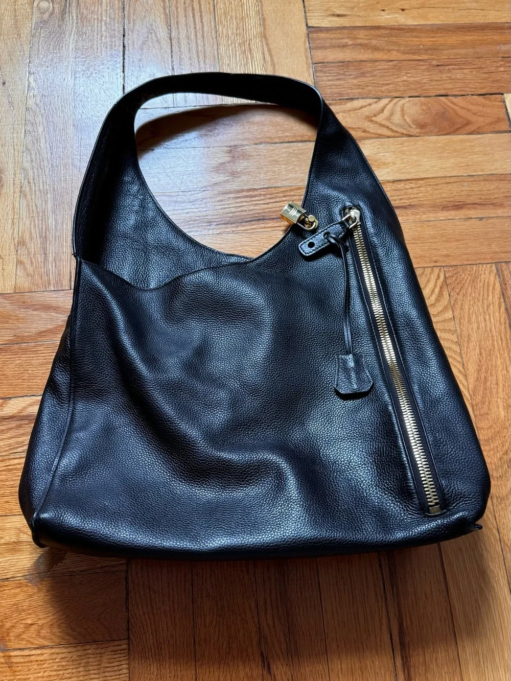 Black Pebbled Leather Shoulder Bag with Gold Zip Accent